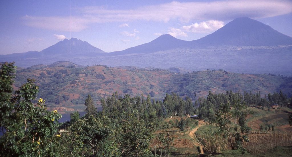 Cloud cap of lenticular clouds over the Virunga Mountains Volcanoes of Sabyinyo Gahinga Muhabura in northwest Rwanda Central Africa